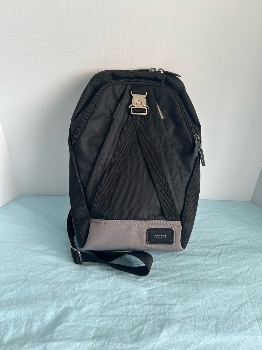 Tumi Black Sling Bag with Gray Front Panel